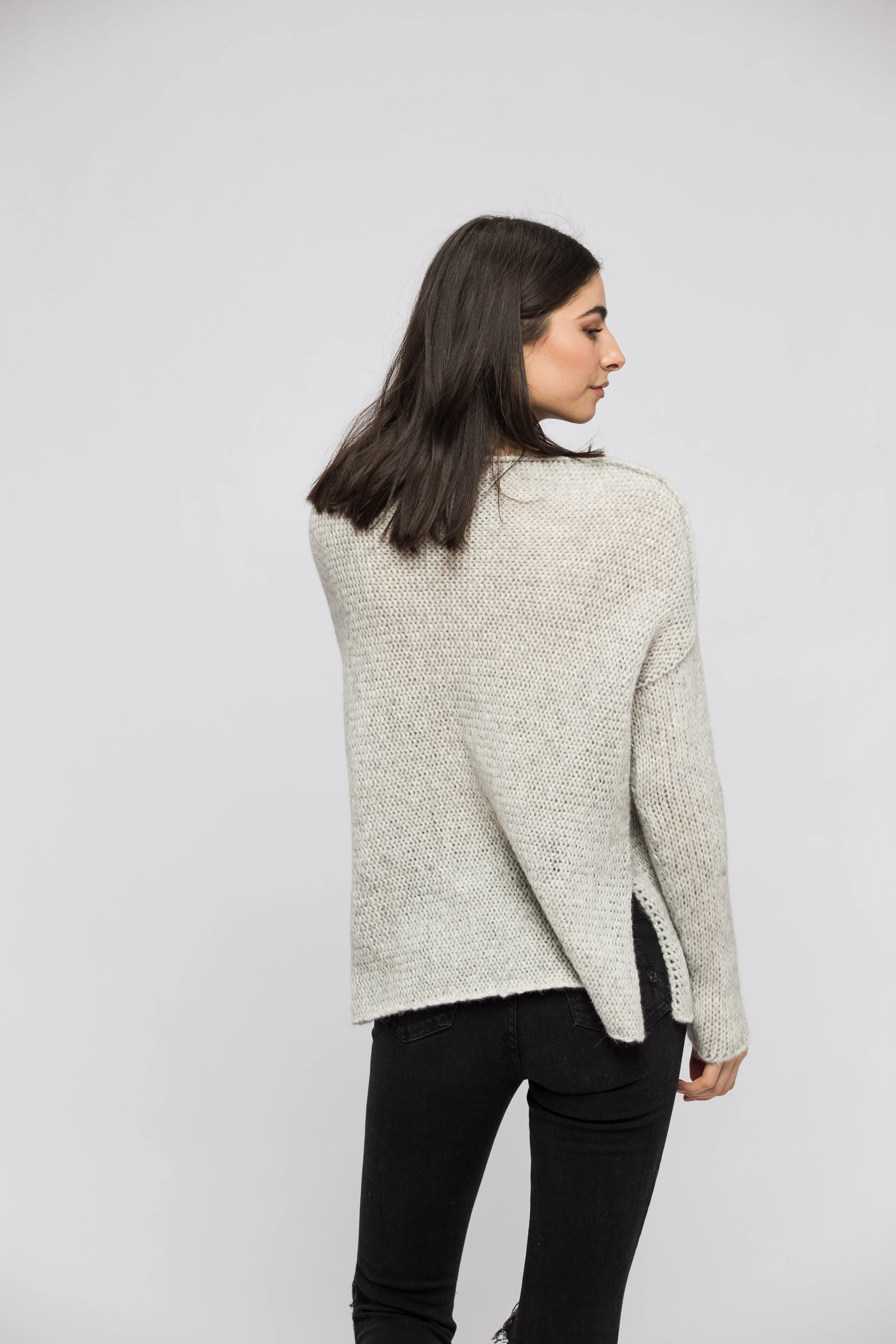 Light grey alpaca sweater.