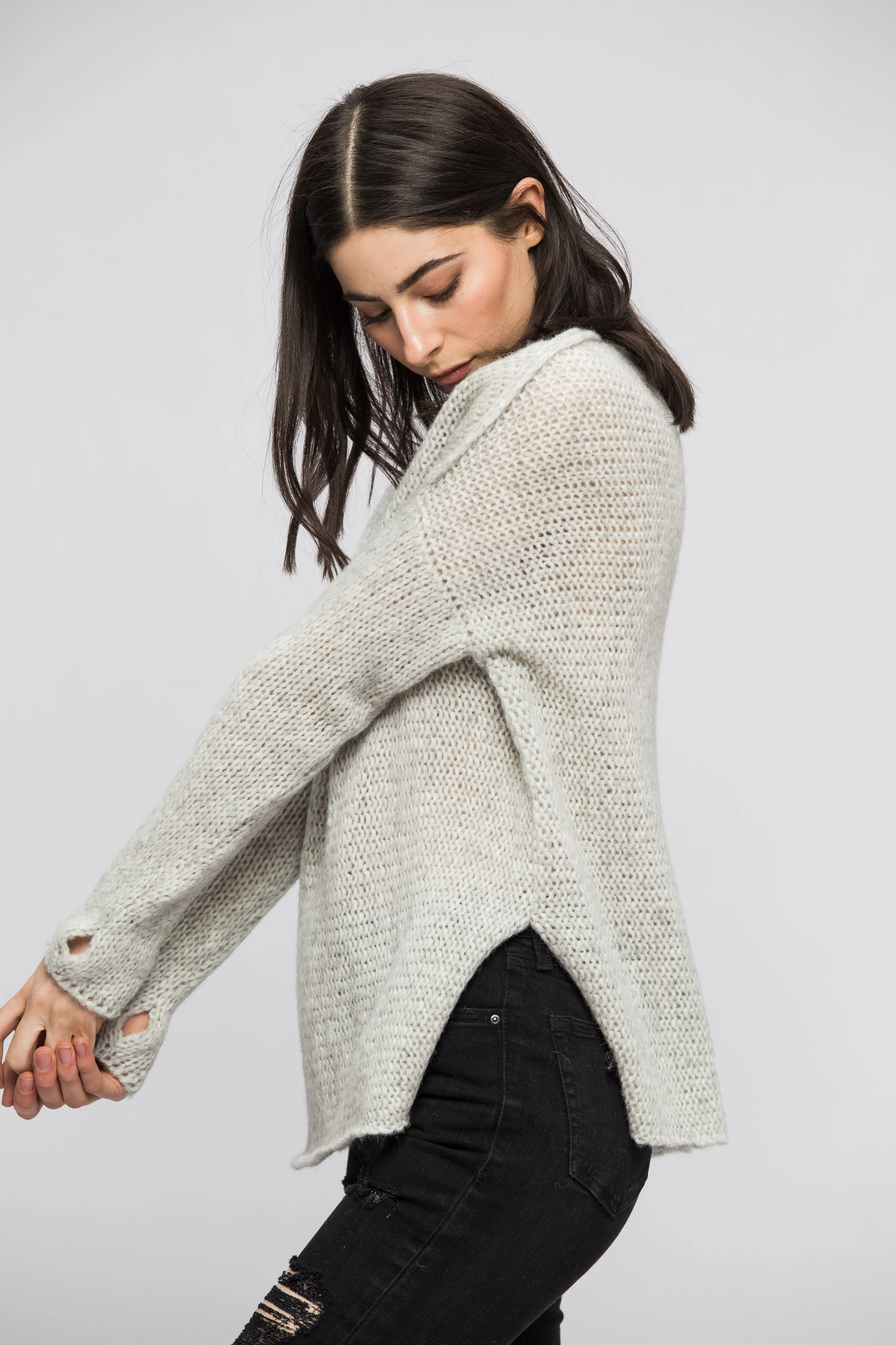 Light grey alpaca sweater.