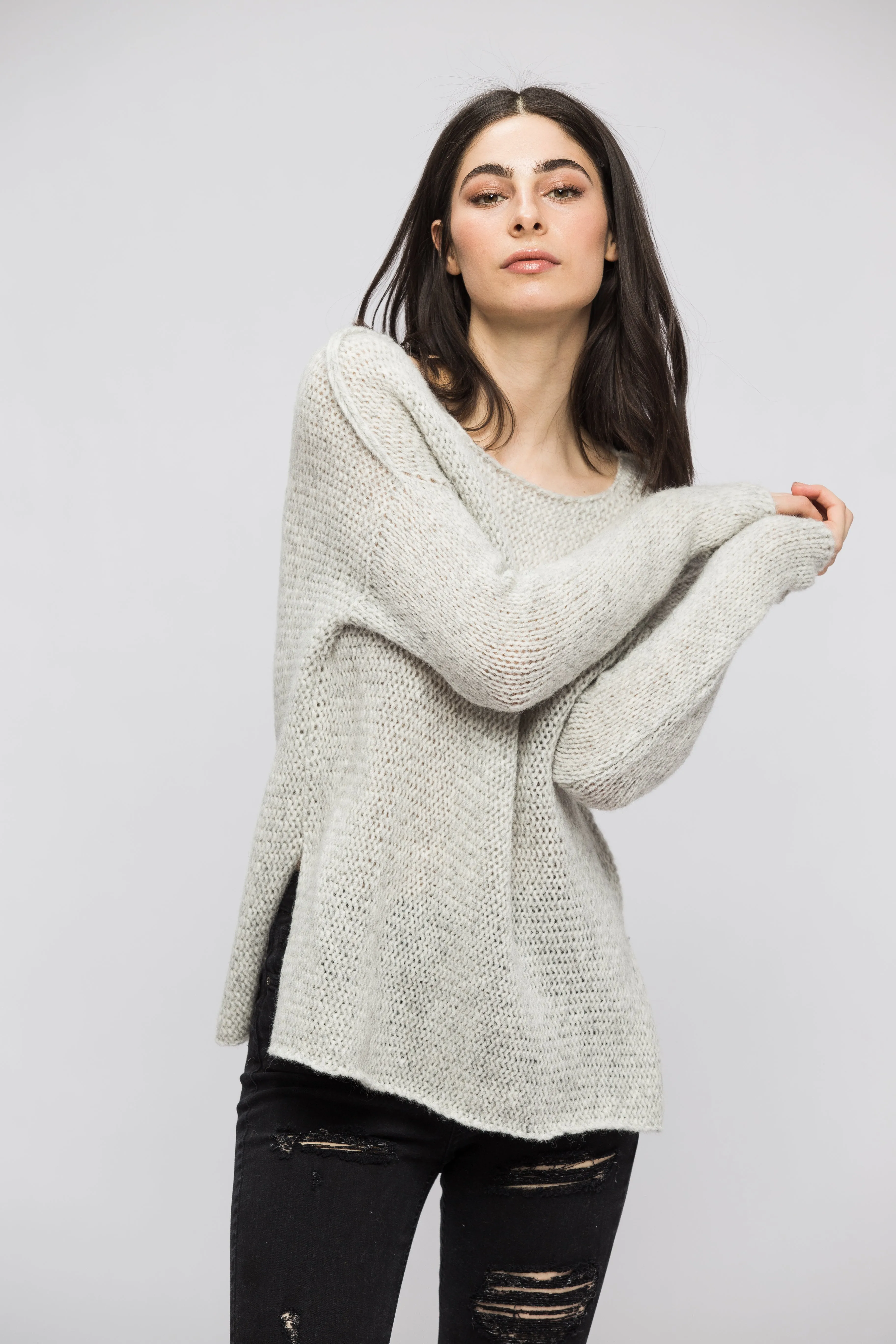 Light grey alpaca sweater.